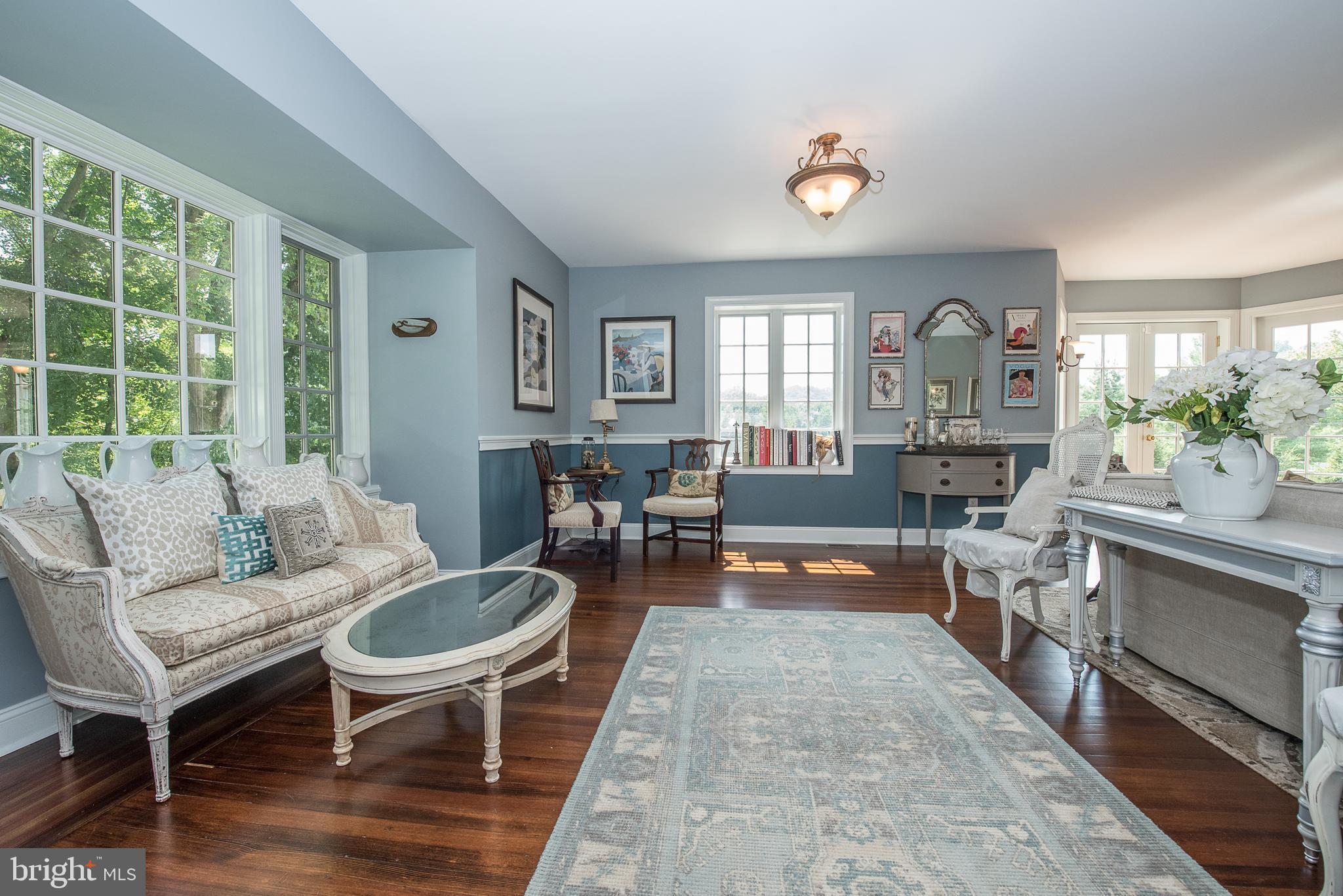 603 Beatty Road Media, PA 19063 - Photo 25 of 84 a living room with furniture and a wooden floor