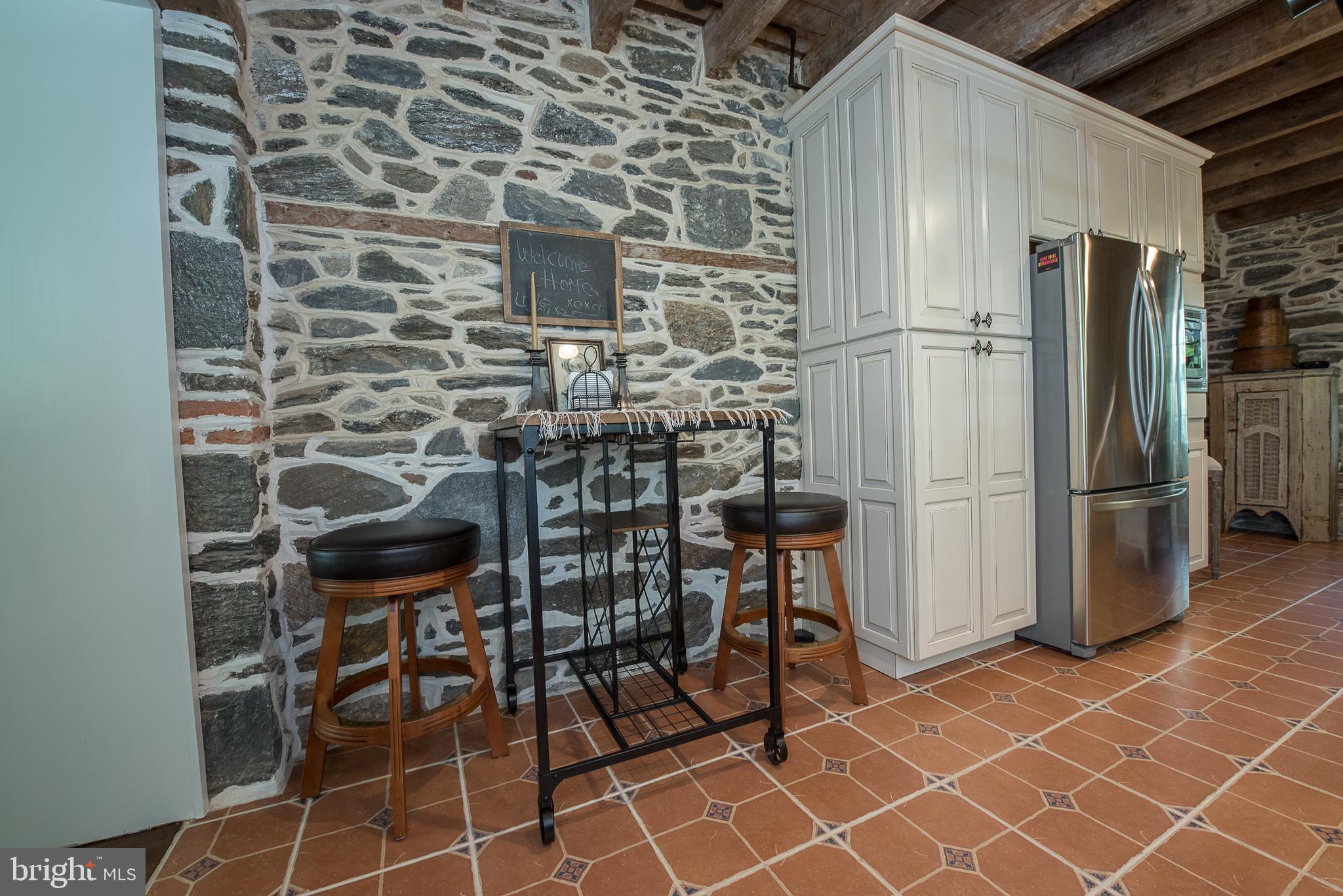 603 Beatty Road Media, PA 19063 - Photo 35 of 84 a kitchen with a sink and a refrigerator