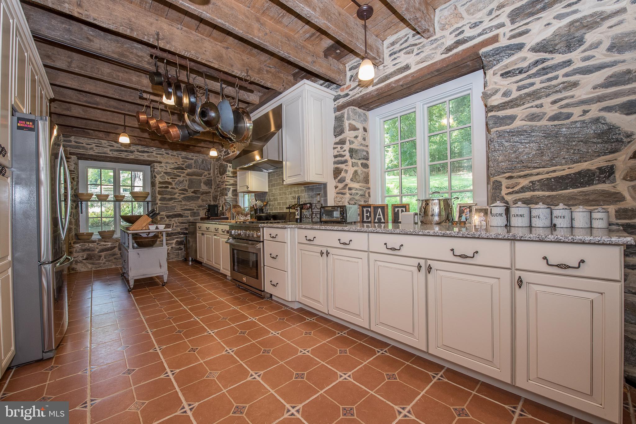 603 Beatty Road Media, PA 19063 - Photo 37 of 84 a kitchen with a sink cabinets and window