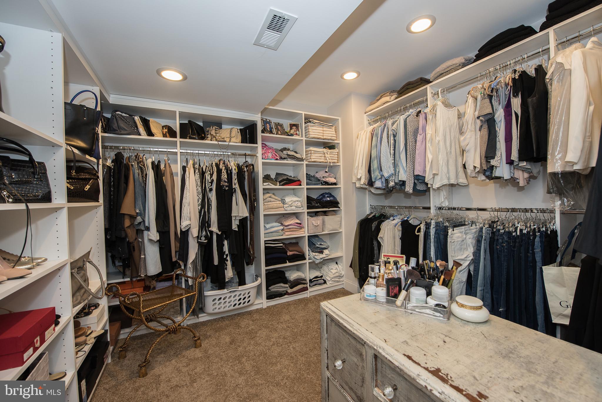 603 Beatty Road Media, PA 19063 - Photo 50 of 84 a view of walk in closet with clothes and shoes