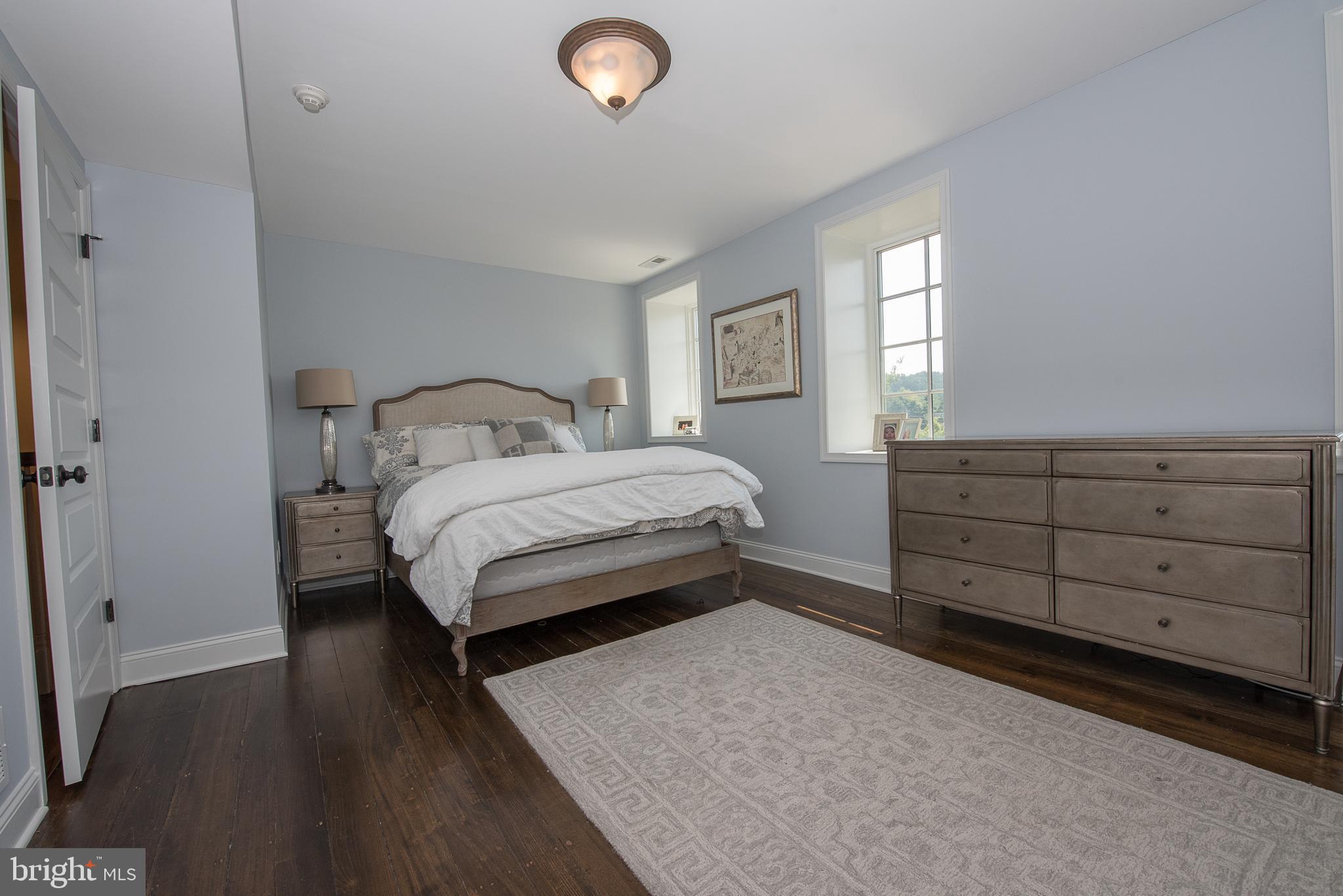 603 Beatty Road Media, PA 19063 - Photo 62 of 84 a bedroom with a bed and a dresser