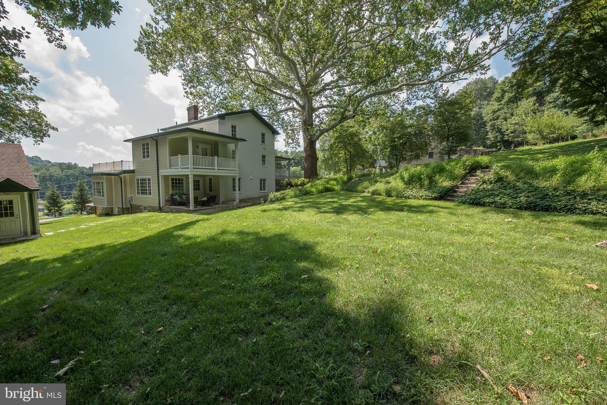 603 Beatty Road Media, PA 19063 - Photo 75 of 84 a view of a house with a big yard and large trees