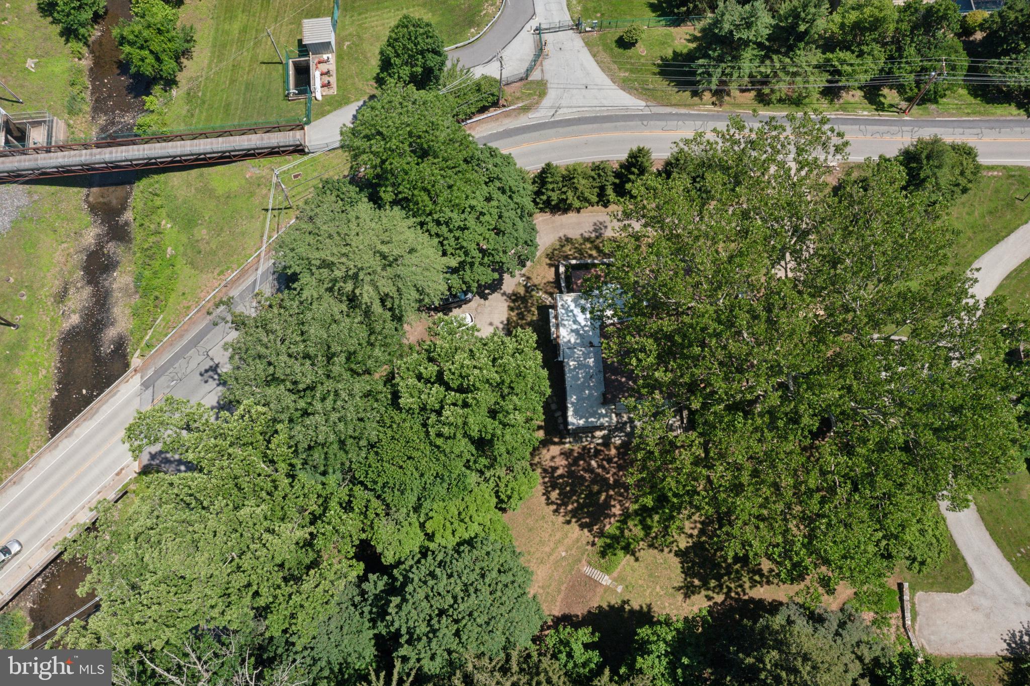603 Beatty Road Media, PA 19063 - Photo 80 of 84 an aerial view of residential house with outdoor space and trees all around