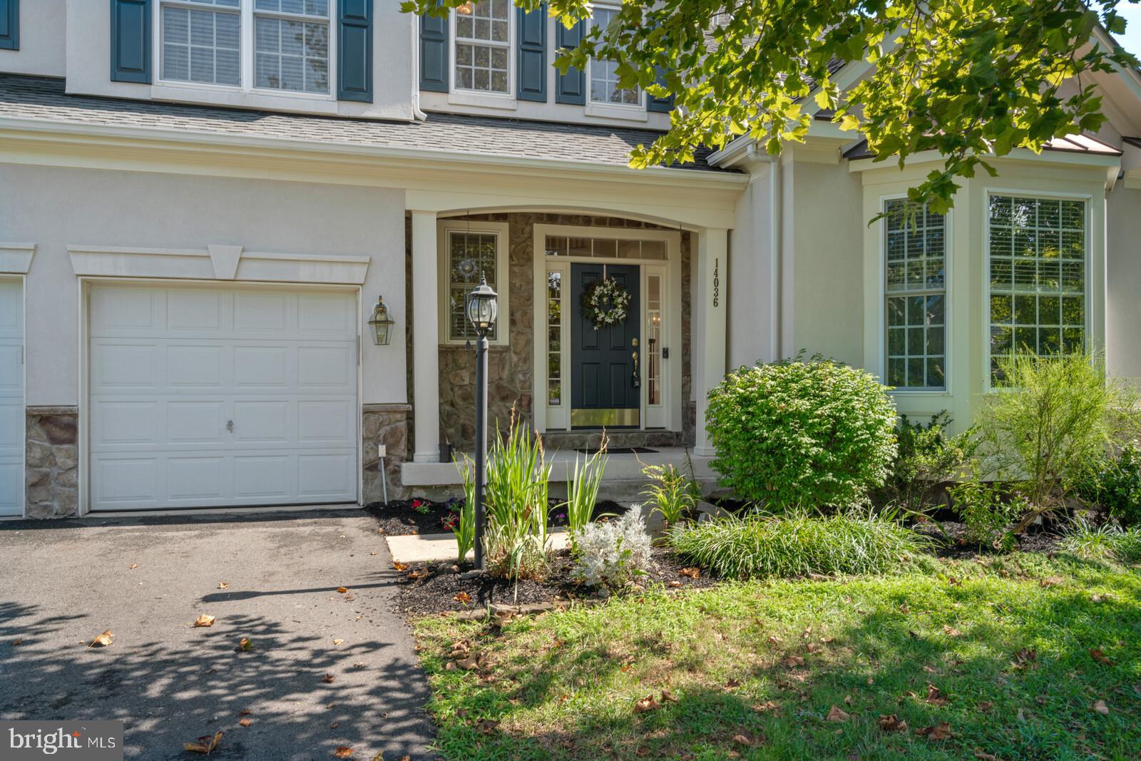 14036 Albert Way Gainesville, VA 20155 - Photo 2 of 40 2 car garage with shelving
