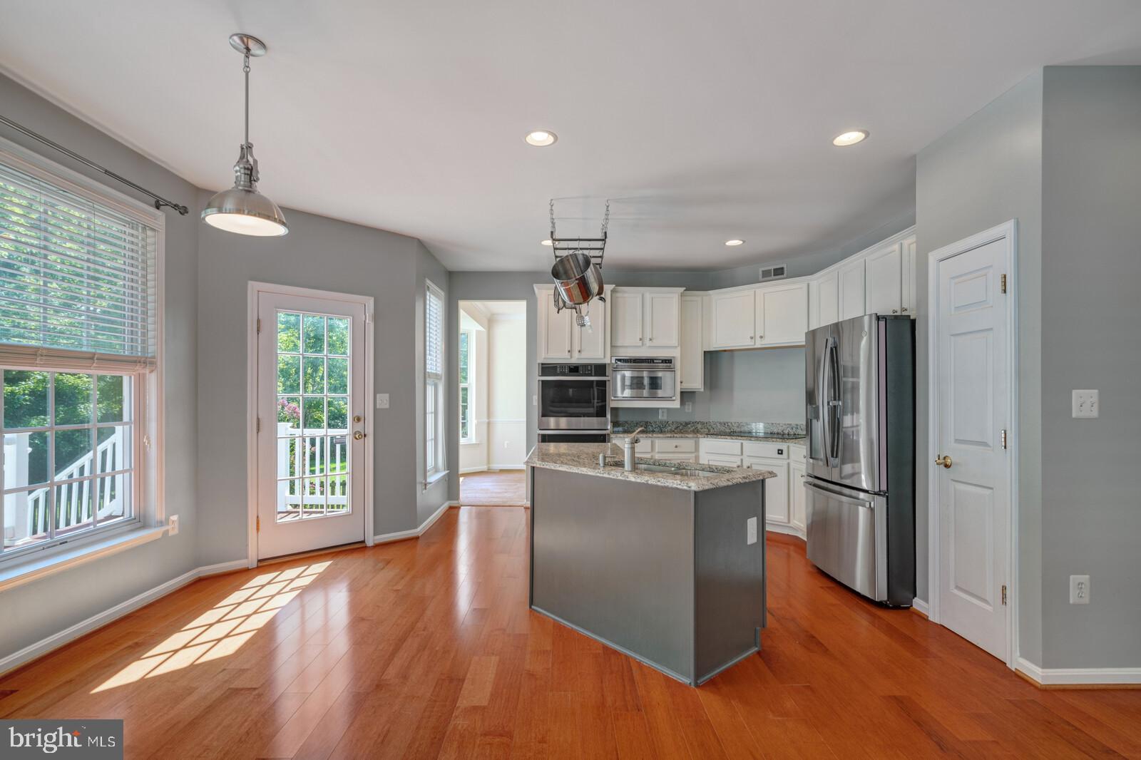 14036 Albert Way Gainesville, VA 20155 - Photo 7 of 40 Access to deck off kitchen