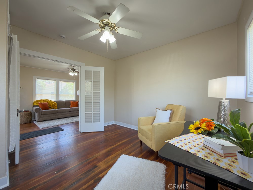 243 West 3rd Avenue Chico, CA 95926 - Photo 11 of 41 a view of a workspace with furniture and wooden floor