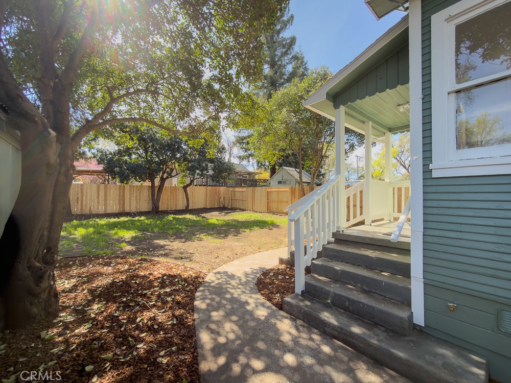 243 West 3rd Avenue Chico, CA 95926 - Photo 37 of 41 a view of a yard with wooden fence