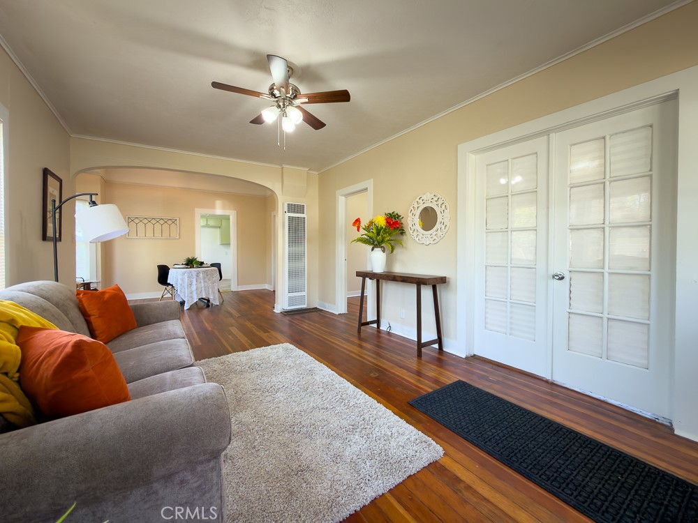 243 West 3rd Avenue Chico, CA 95926 - Photo 9 of 41 a living room with furniture and a chandelier