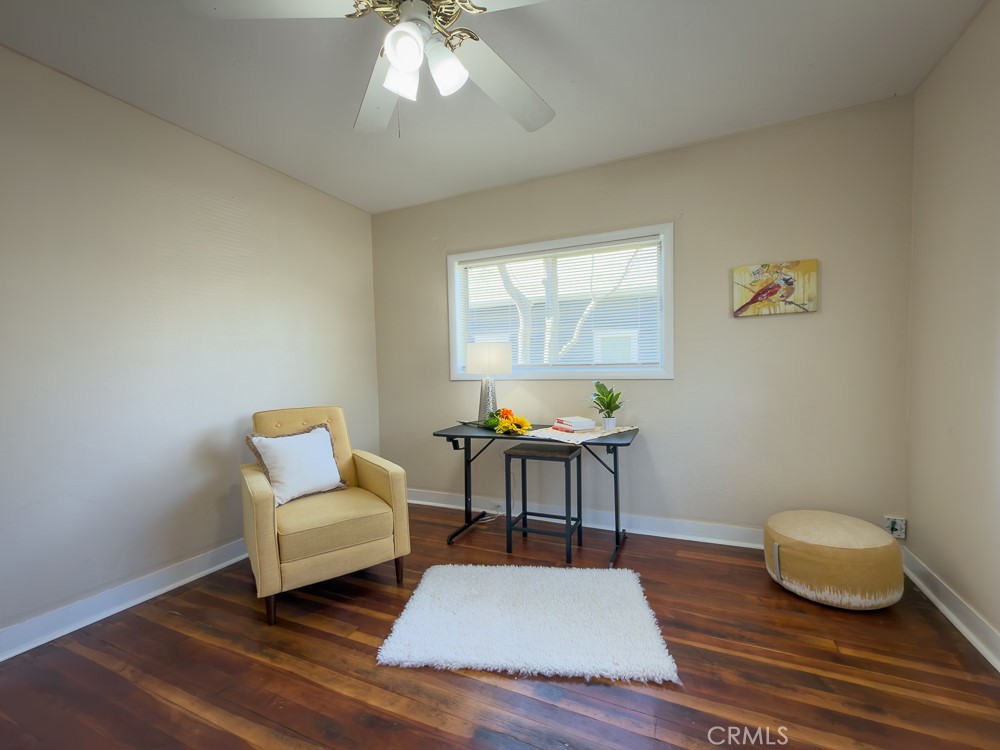 243 West 3rd Avenue Chico, CA 95926 - Photo 10 of 41 a living room with furniture and a wooden floor
