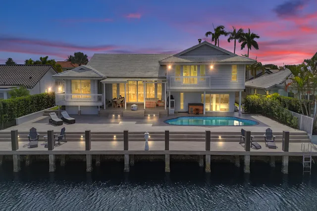 a front view of a house with a ocean view