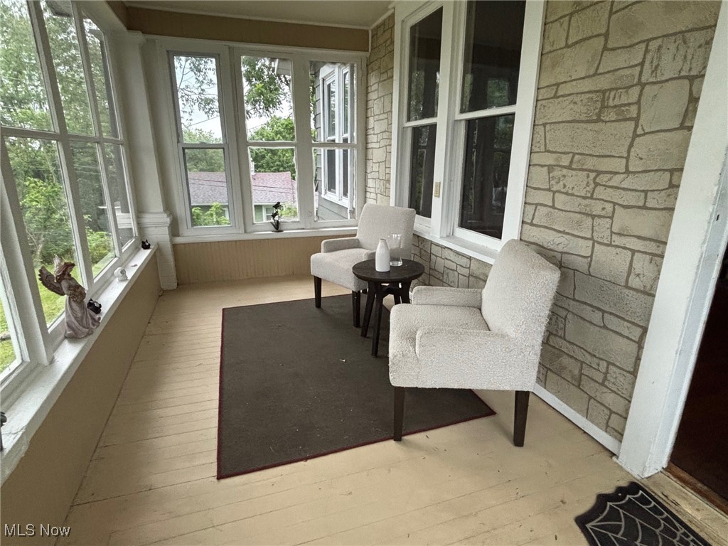 748 Bellview Road Cambridge, OH 43725 - Photo 2 of 20 Sunroom on the front of the house facing west