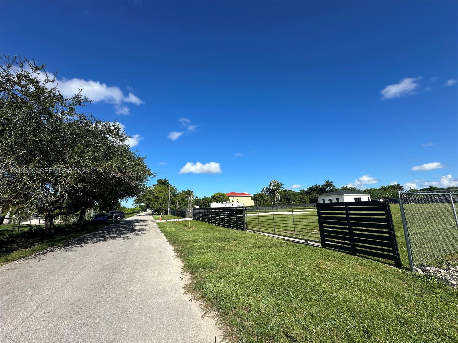 19690 Southwest 206th Street Miami, FL 33187 - Photo 7 of 24 a view of a golf course with a garden