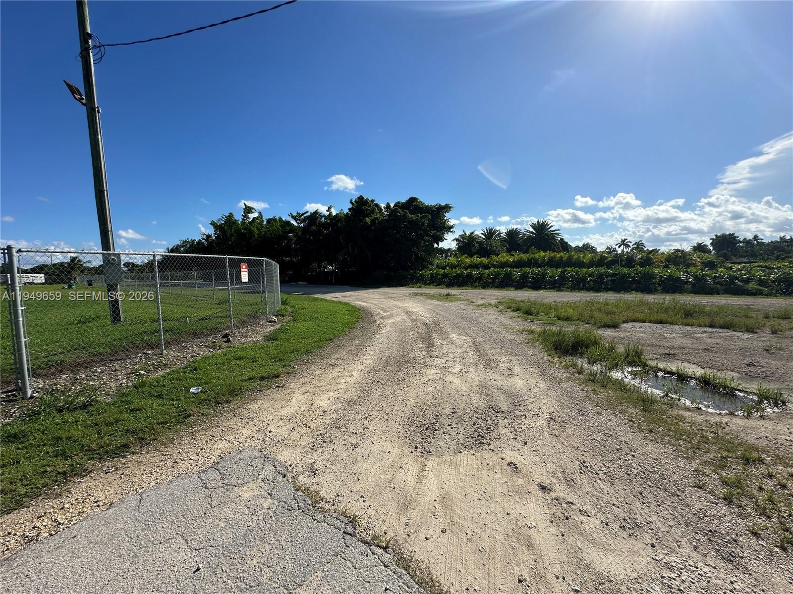 19690 Southwest 206th Street Miami, FL 33187 - Photo 10 of 24 a view of a backyard