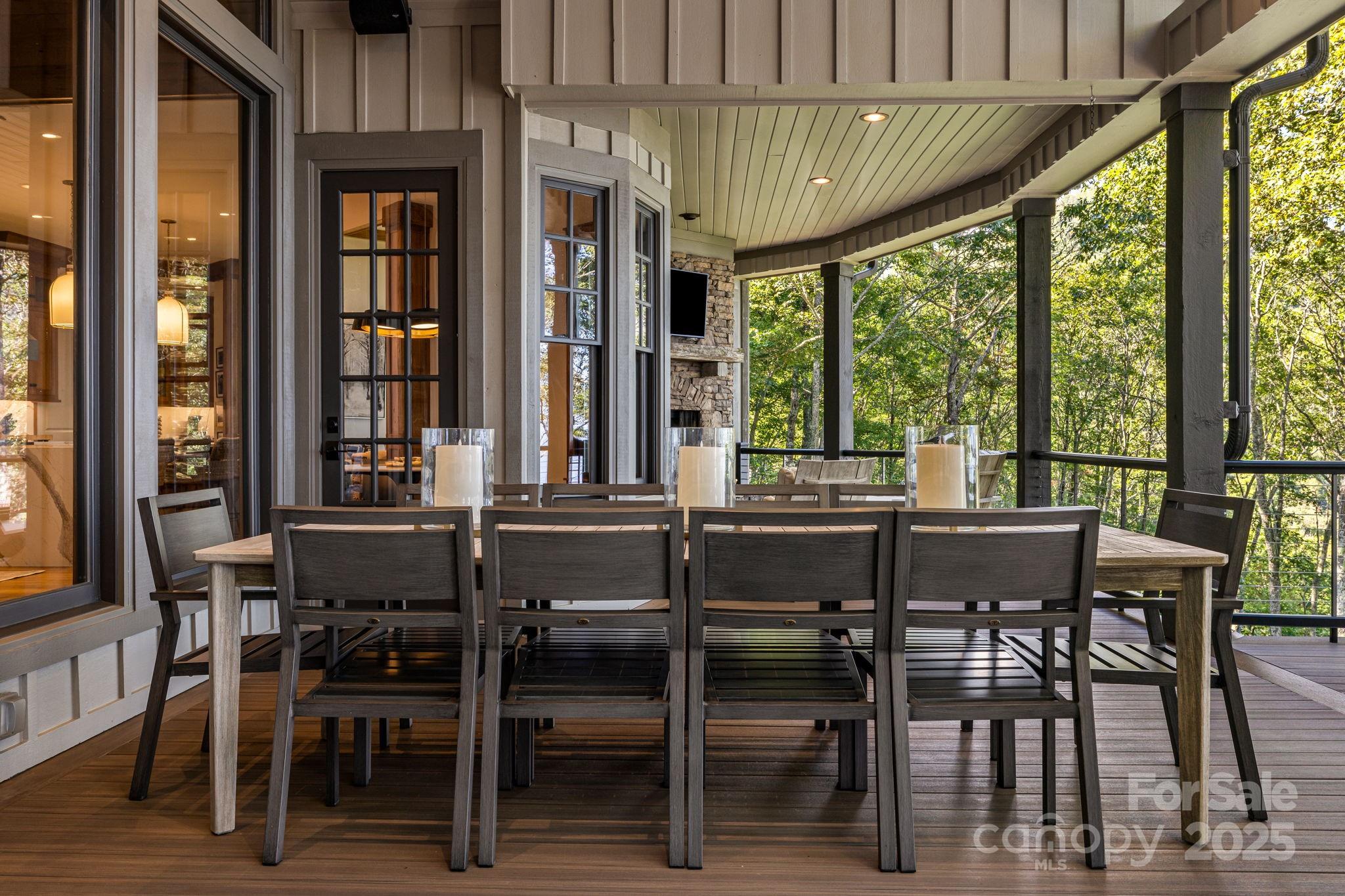 85 Back Bone Way, Unit 200 Sylva, NC 28779 - Photo 18 of 48 a view of a dining room with furniture window and outside view