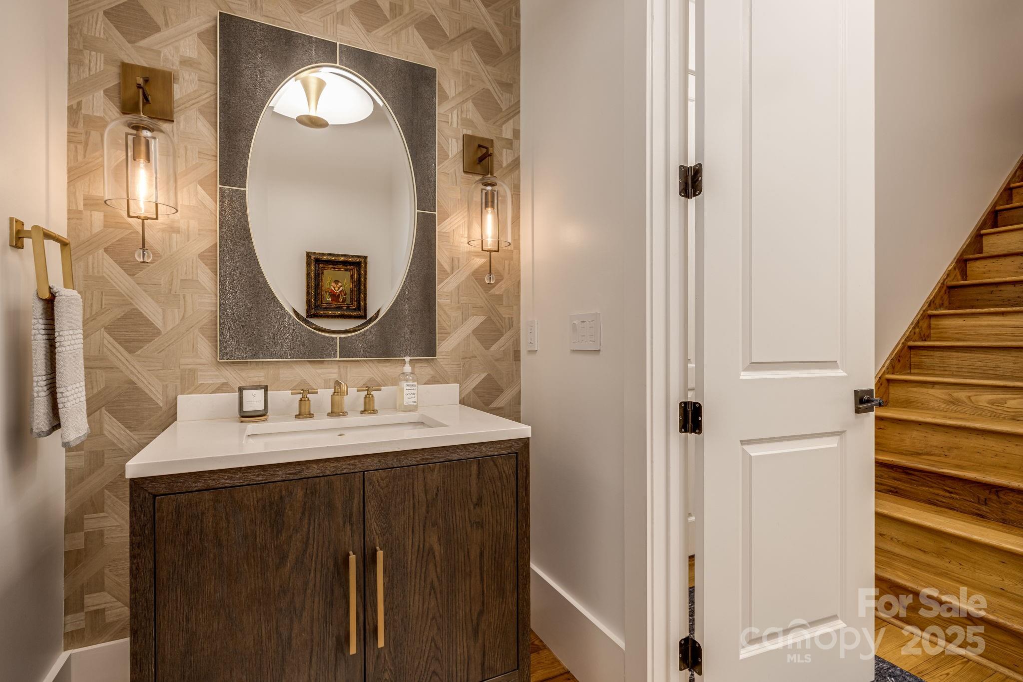 85 Back Bone Way, Unit 200 Sylva, NC 28779 - Photo 24 of 48 a bathroom with a sink and a mirror