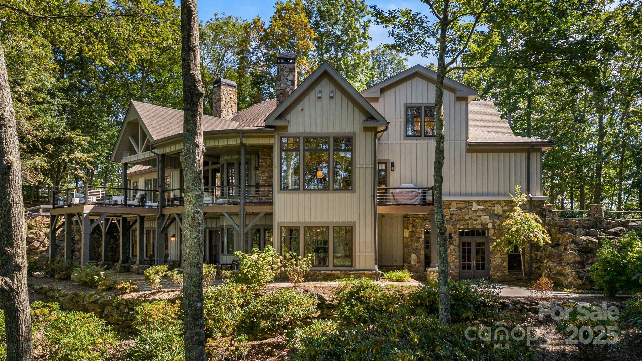 85 Back Bone Way, Unit 200 Sylva, NC 28779 - Photo 4 of 48 a front view of a house with a yard