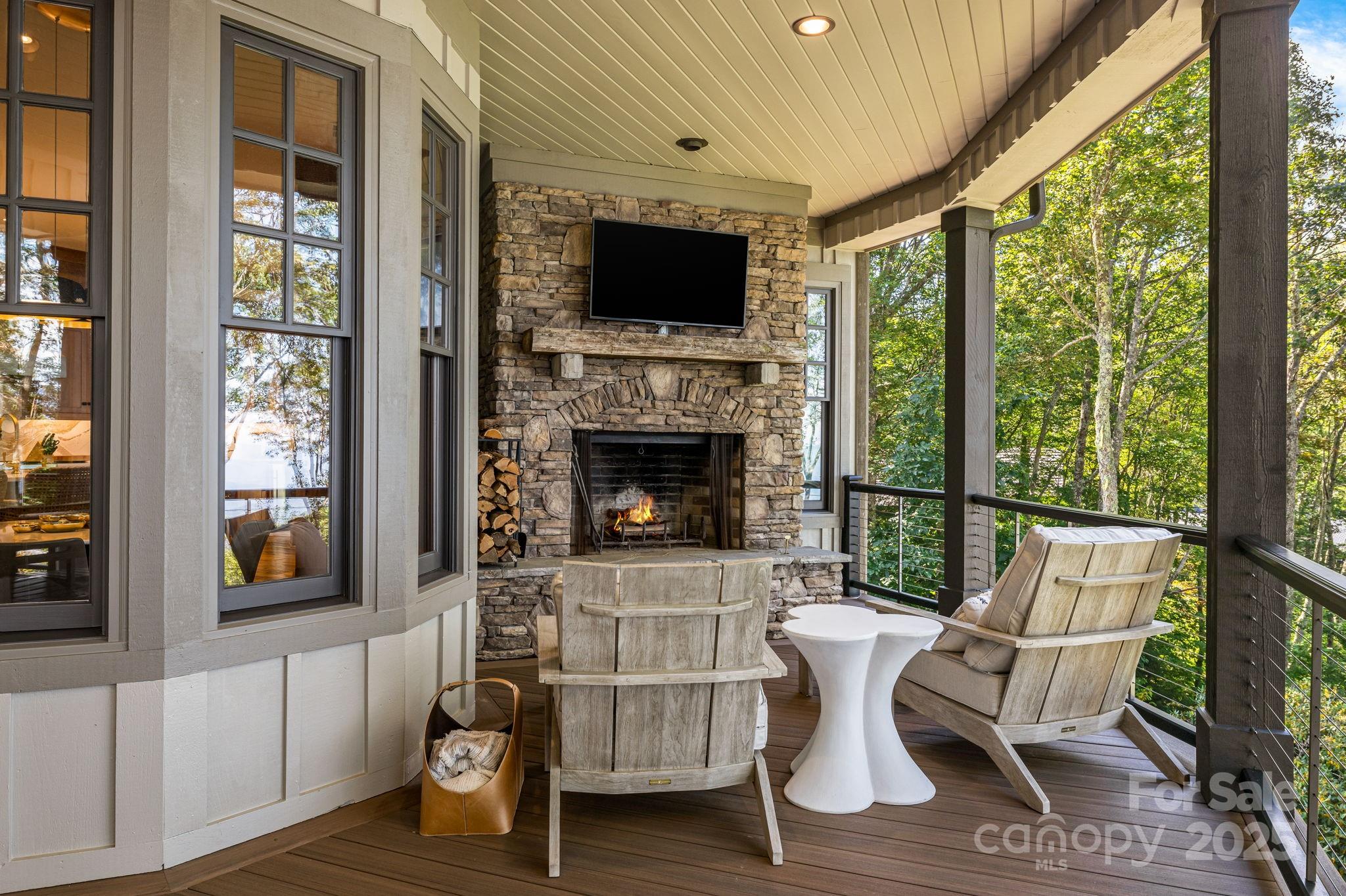 85 Back Bone Way, Unit 200 Sylva, NC 28779 - Photo 42 of 48 a workspace with furniture and a fireplace
