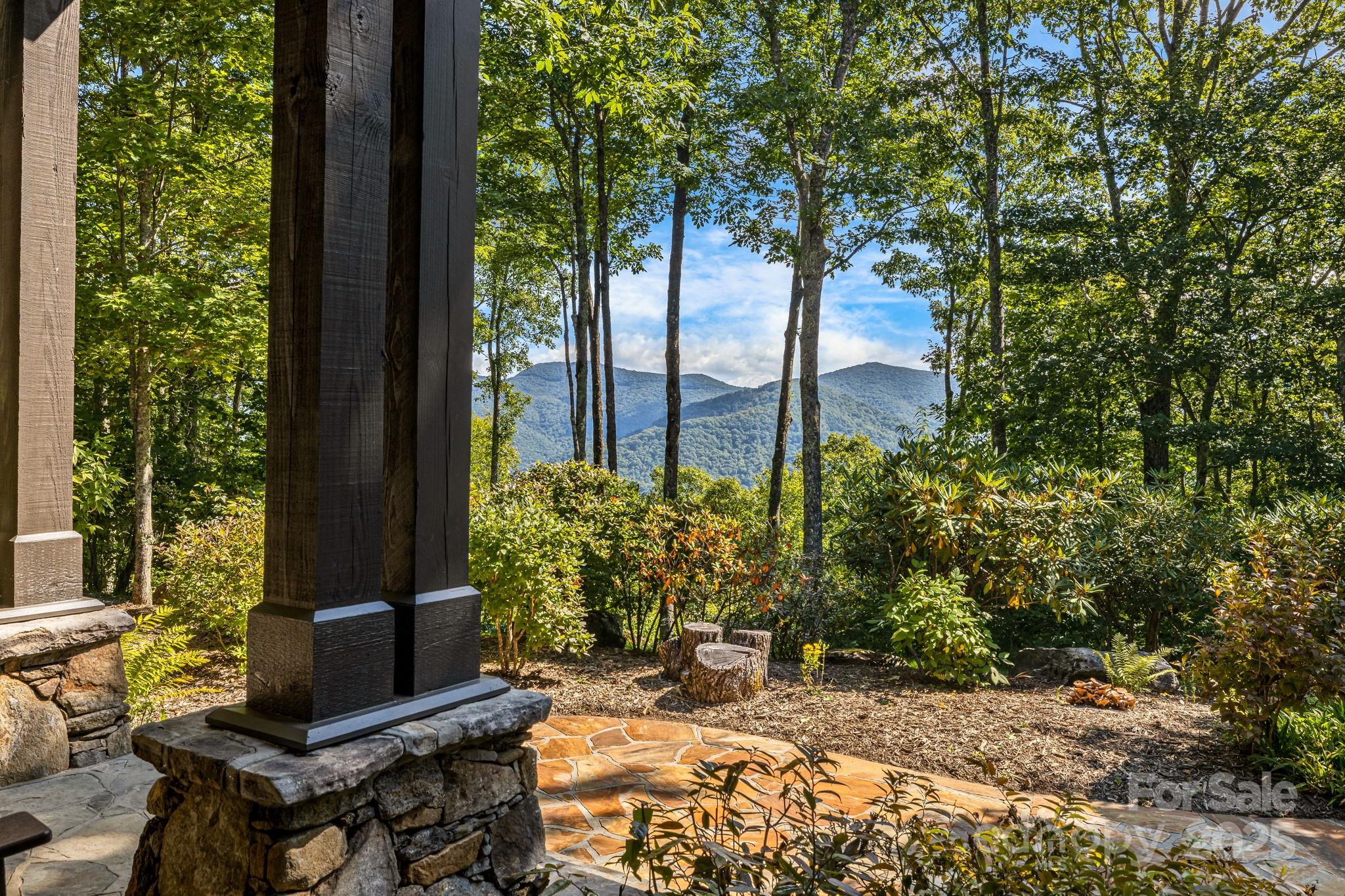 85 Back Bone Way, Unit 200 Sylva, NC 28779 - Photo 45 of 48 a backyard of a house with outdoor seating