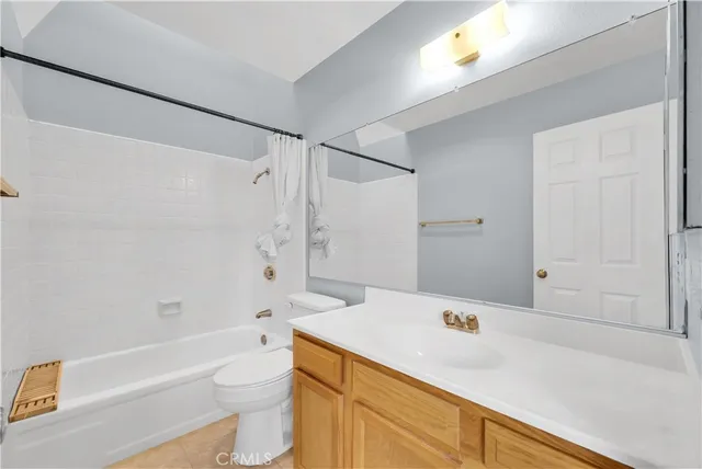 a bathroom with a sink a toilet and a bathtub