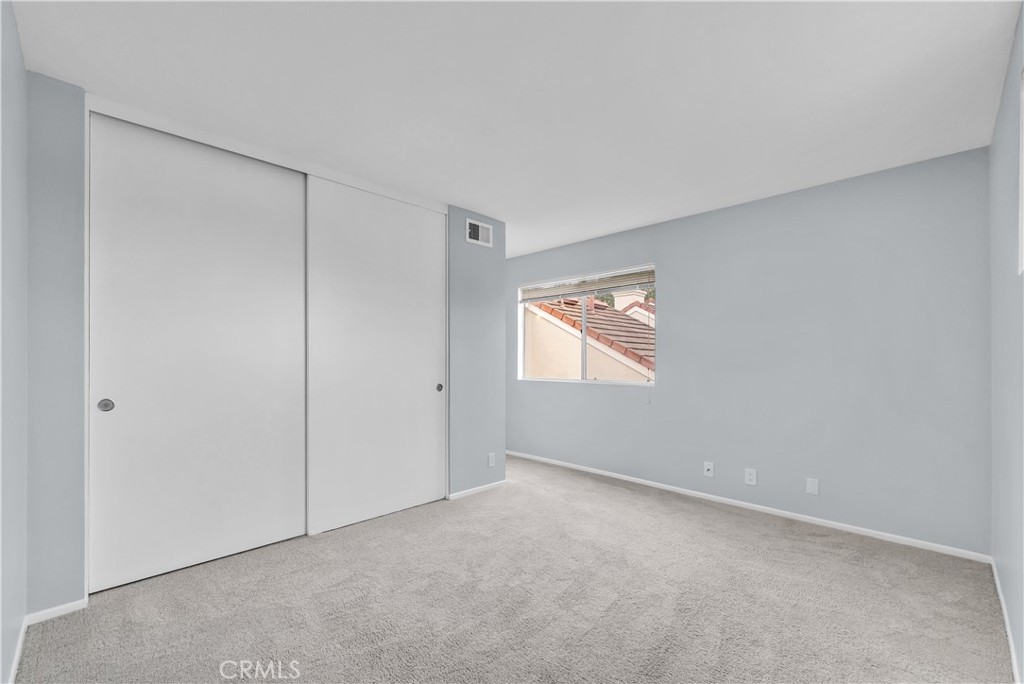 4 Wellesley Irvine, CA 92612 - Photo 17 of 24 a view of an empty room and a window