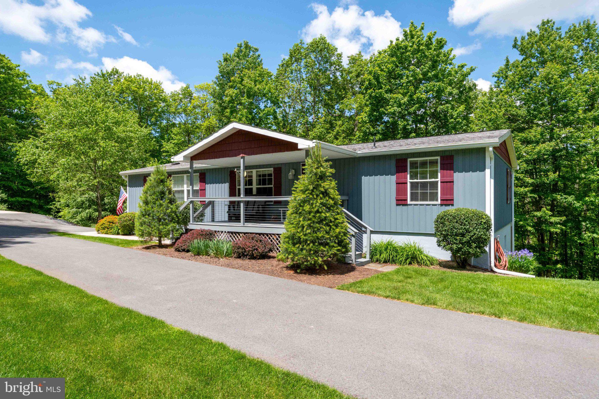 511 Hill Top Road Oakland, MD 21550 - Photo 6 of 51 Charming home nestled in lush greenery.