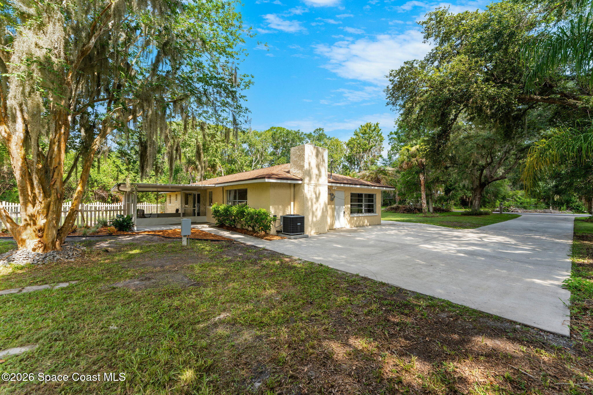 5041 Scott Road Cocoa, FL 32926 - Photo 44 of 52 sideyard:driveway