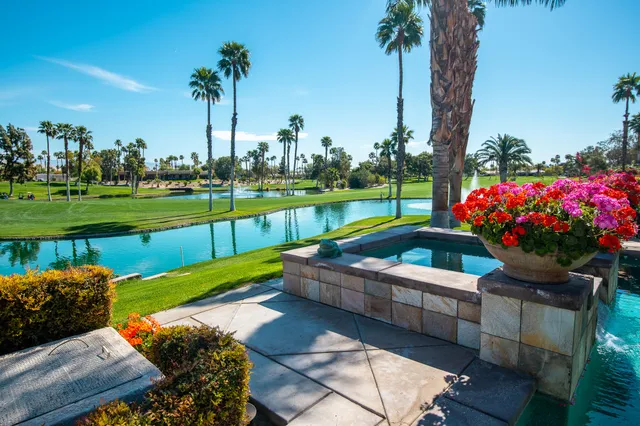 a garden view with a seating space