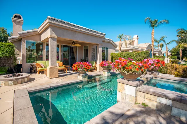 a view of a house with patio outdoor seating area