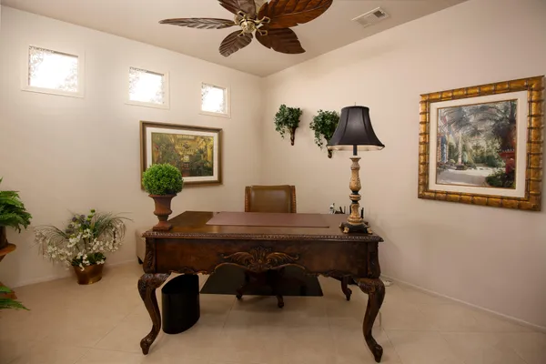 a view of a workspace with furniture