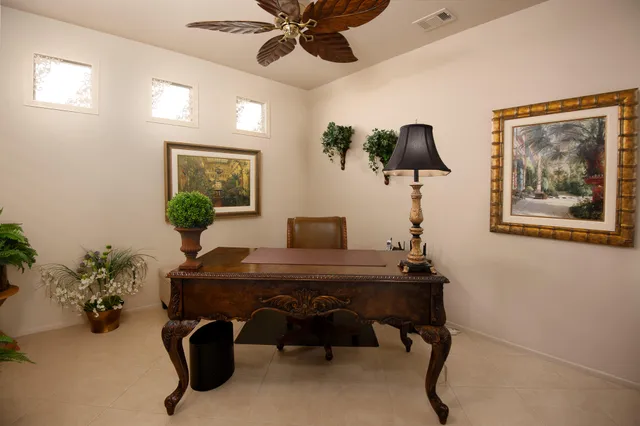 a view of a workspace with furniture