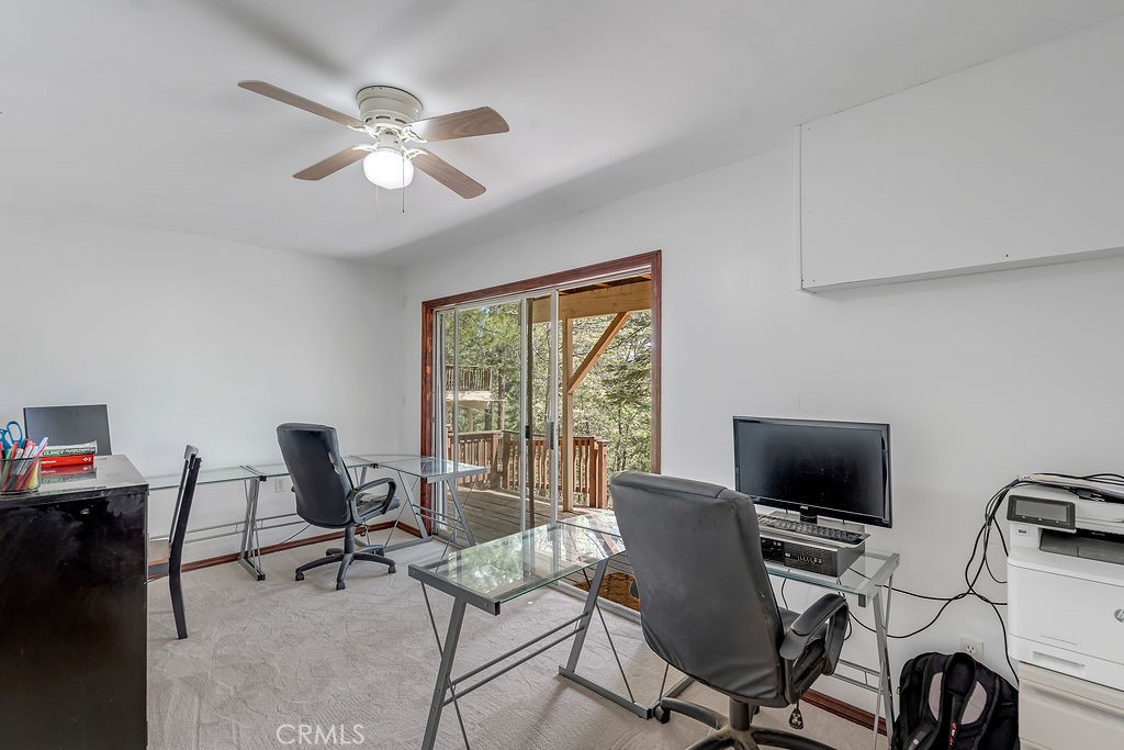 318 Old Toll Road Lake Arrowhead, CA 92352 - Photo 32 of 44 a view of a workspace with furniture and a window
