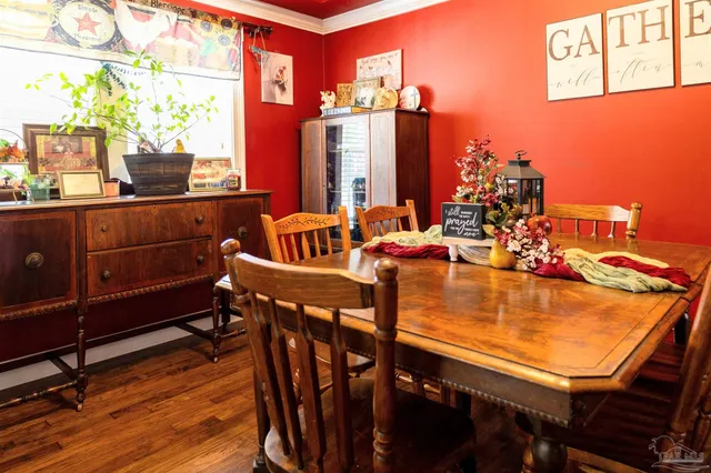 a kitchen with refrigerator cabinets and furniture