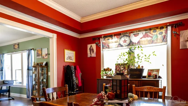 a kitchen with stainless steel appliances granite countertop a stove and cabinets