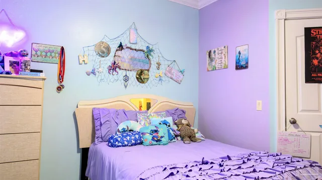 a bathroom with a glass door shower and a sink