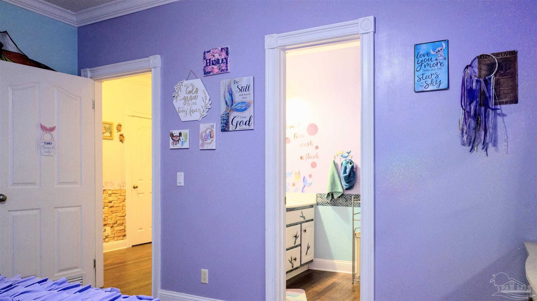 1700 Prospect Road Coffeeville, AL 36524 - Photo 35 of 71 a bathroom with a sink a mirror and a shower curtain