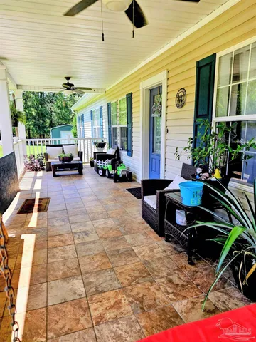 a view of a large green space with lots of trees