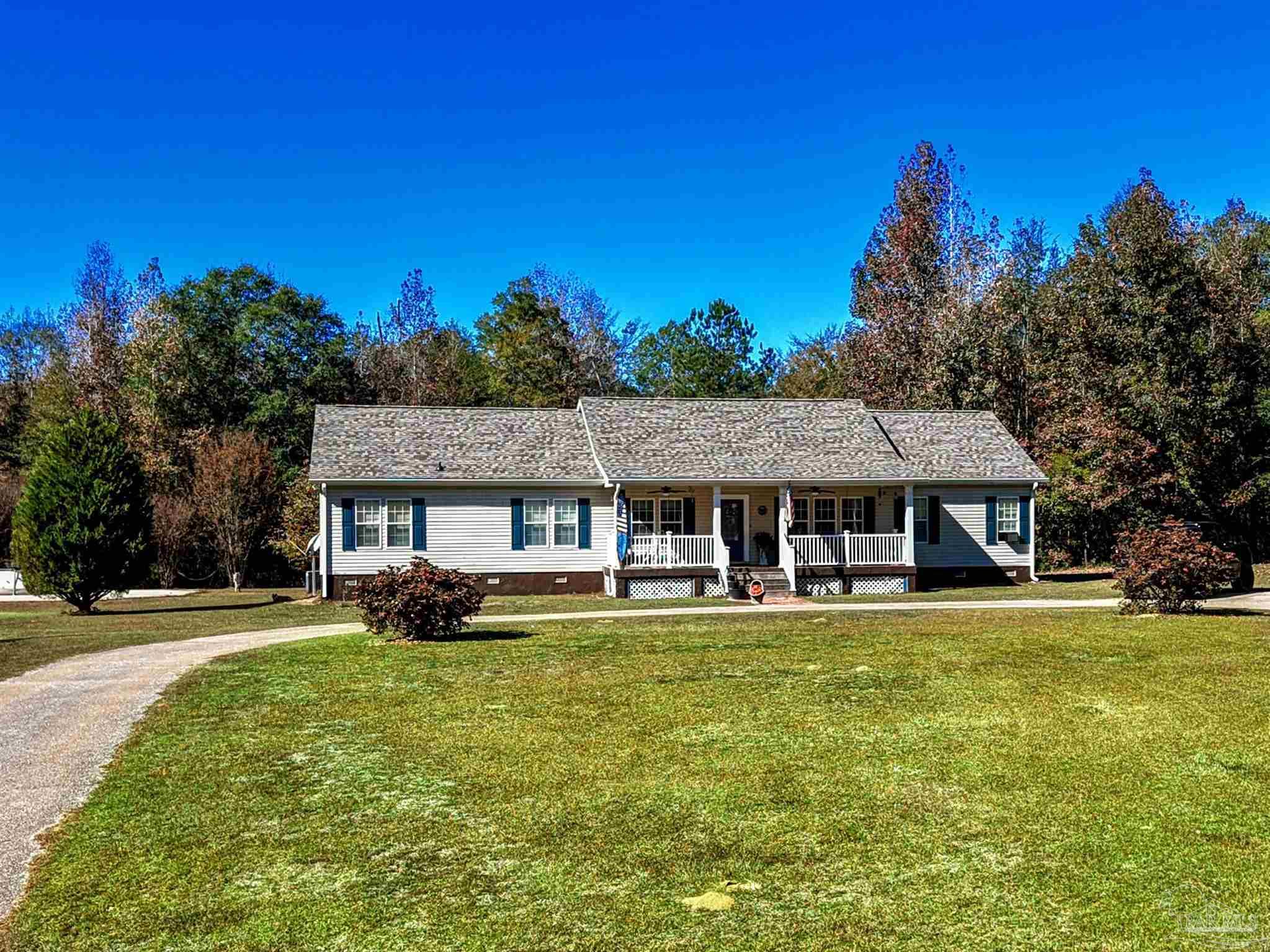 1700 Prospect Road Coffeeville, AL 36524 - Photo 55 of 71 a view of a house with a big yard and large trees