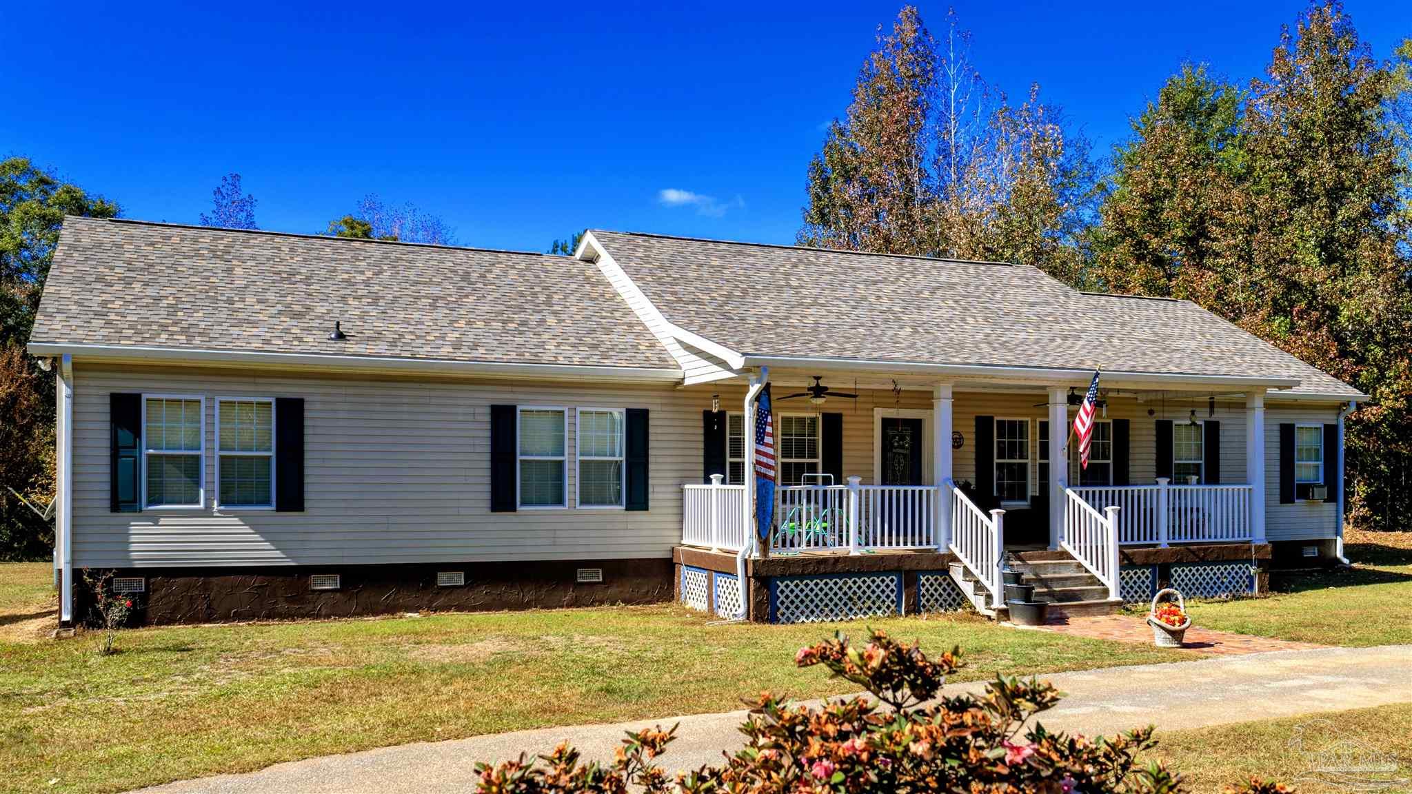 1700 Prospect Road Coffeeville, AL 36524 - Photo 58 of 71 a view of a house with a swimming pool