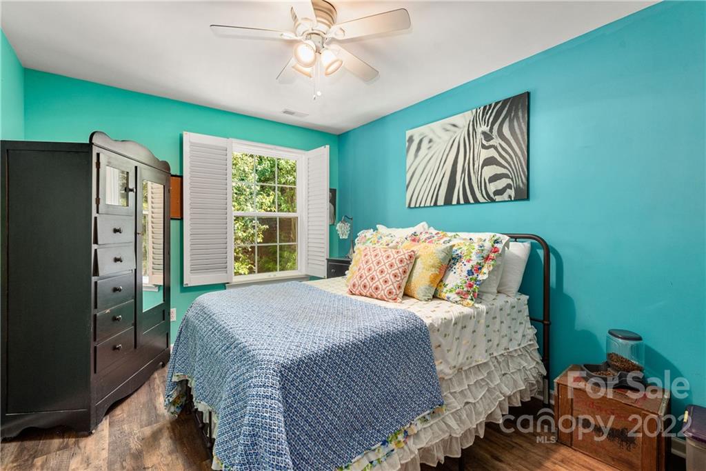 1921 Travertine Lane Fort Mill, SC 29708 - Photo 20 of 27 a bedroom with a bed and a large window