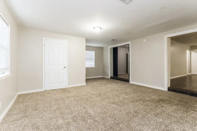 an empty room with an entryway