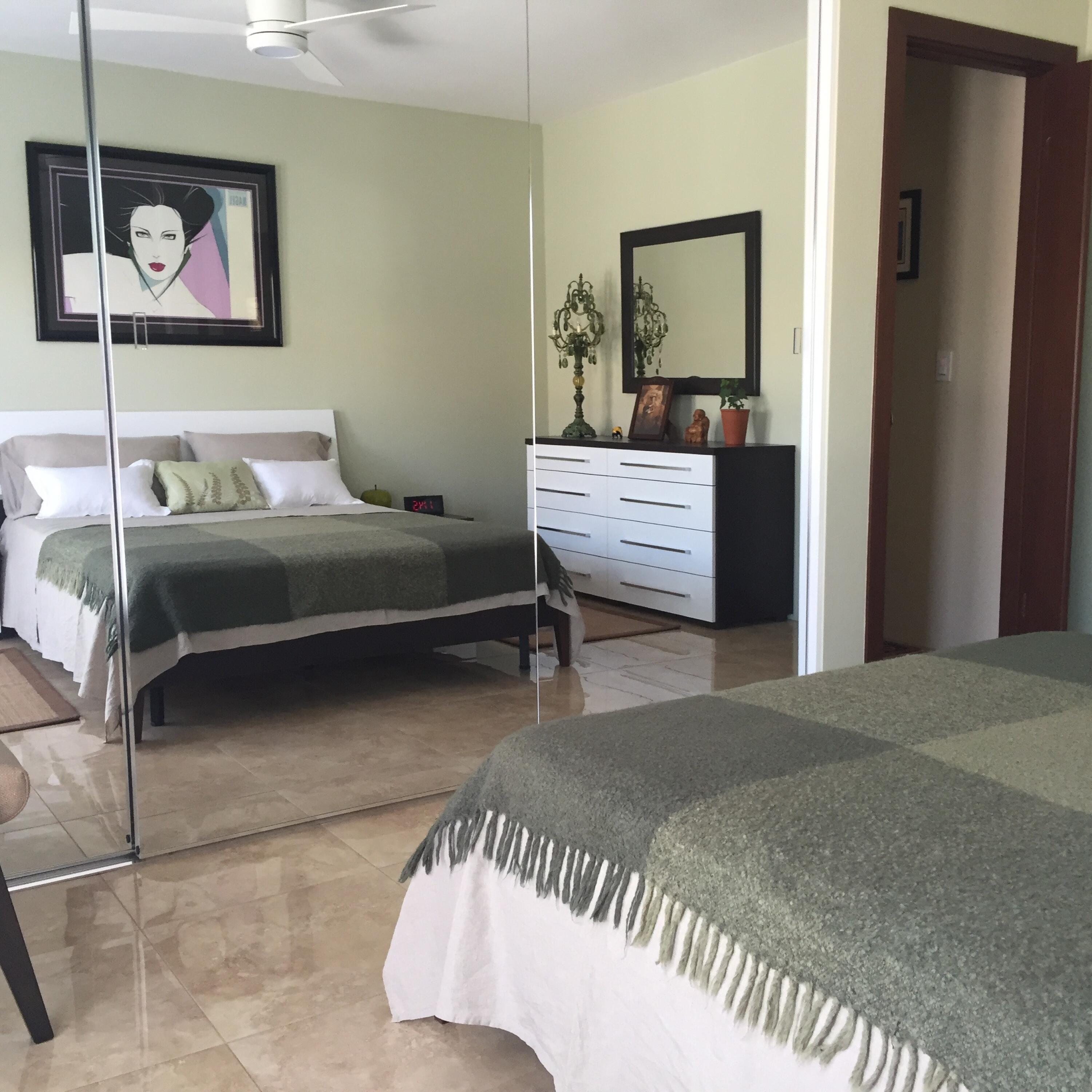 1490 East Racquet Club Road Palm Springs, CA 92262 - Photo 24 of 29 a bedroom with a bed and furniture