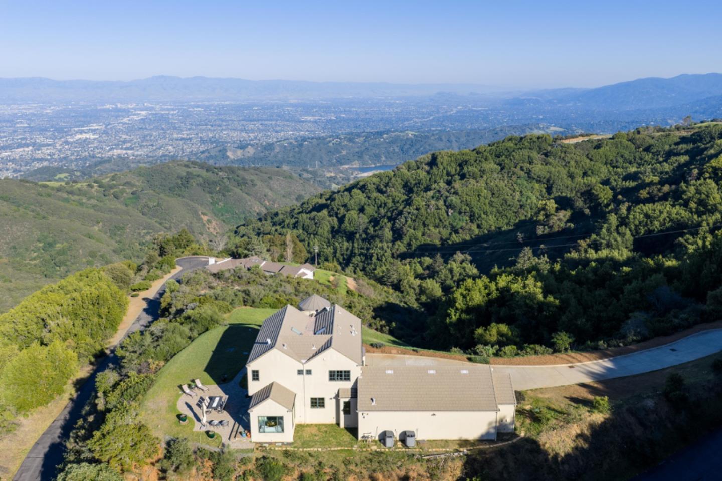 17599 Montebello Road Cupertino, CA 95014 - Photo 62 of 83 an aerial view of a house with a yard