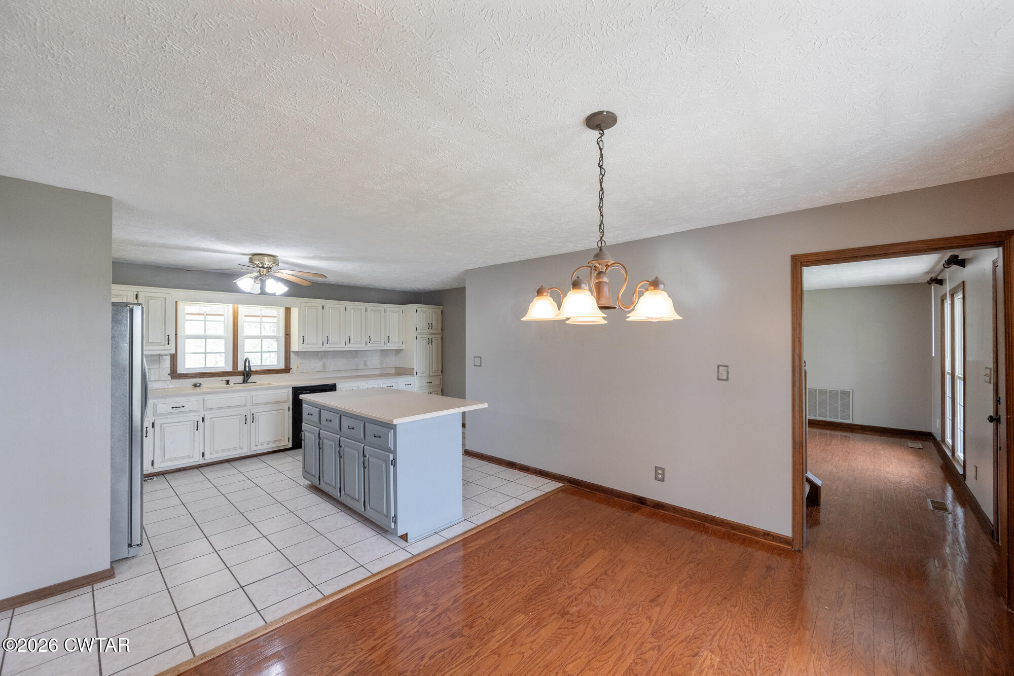 741 Independence Loop Lexington, TN 38351 - Photo 14 of 30 a kitchen with sink cabinets and window