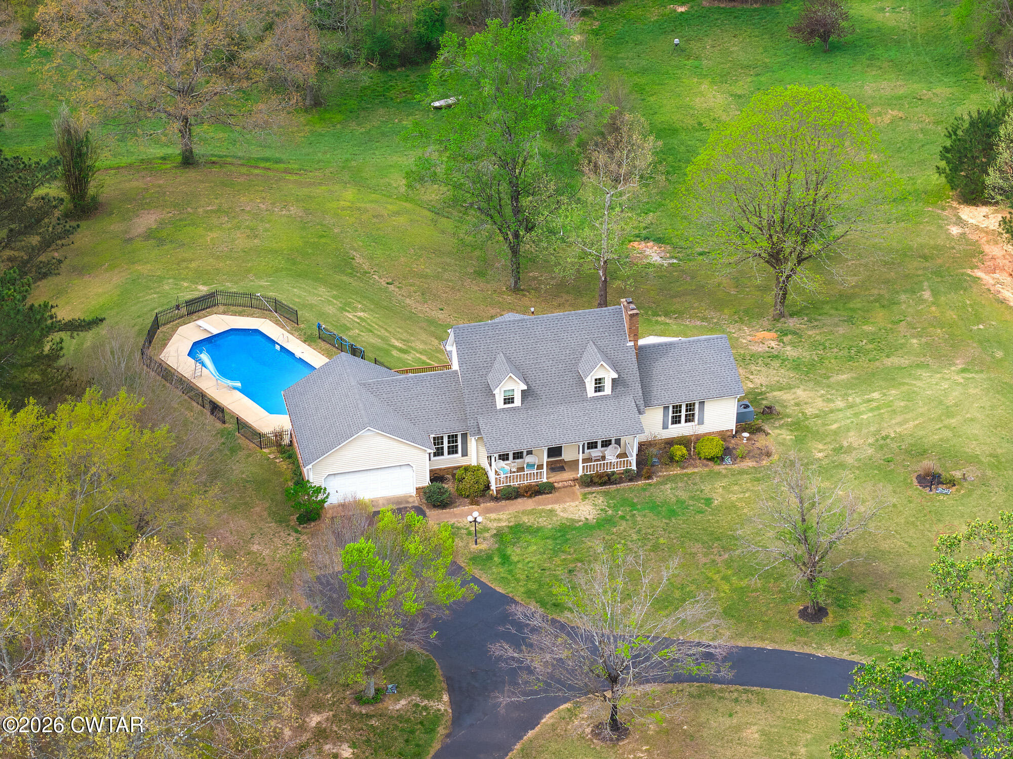 741 Independence Loop Lexington, TN 38351 - Photo 8 of 30 an aerial view of a house with a yard