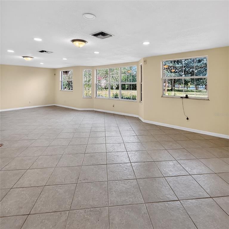 17220 Estes Road Lutz, FL 33548 - Photo 8 of 25 a view of an empty room with a window