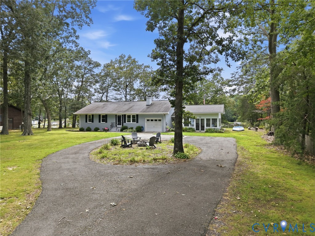 597 Harbor Drive Reedville, VA 22539 - Photo 5 of 34 Ranch-style residence featuring light gray siding