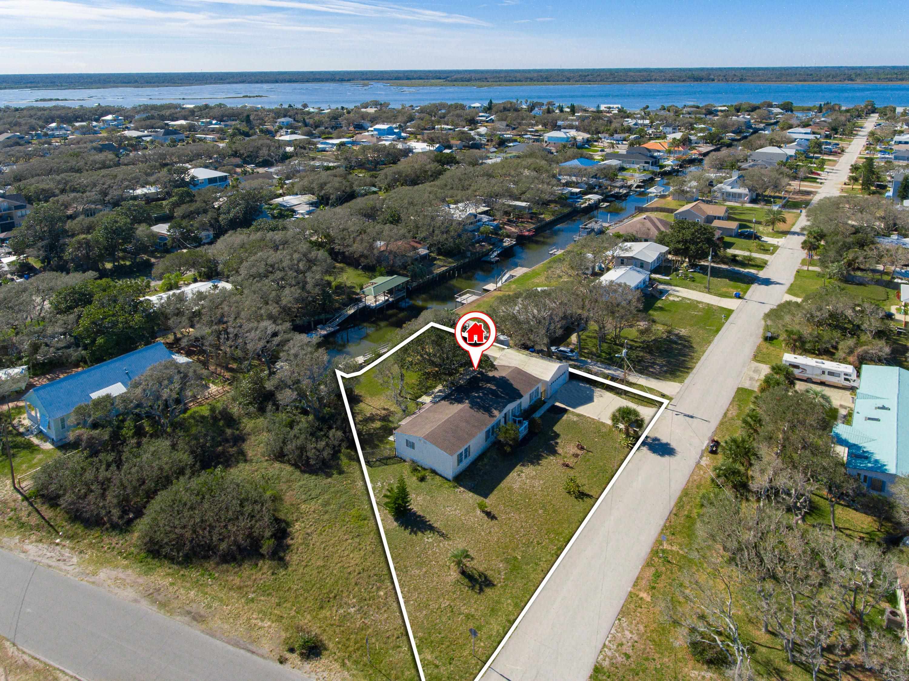 205 Treasure Beach Road St. Augustine, FL 32080 - Photo 41 of 43 an aerial view of residential houses with outdoor space and swimming pool