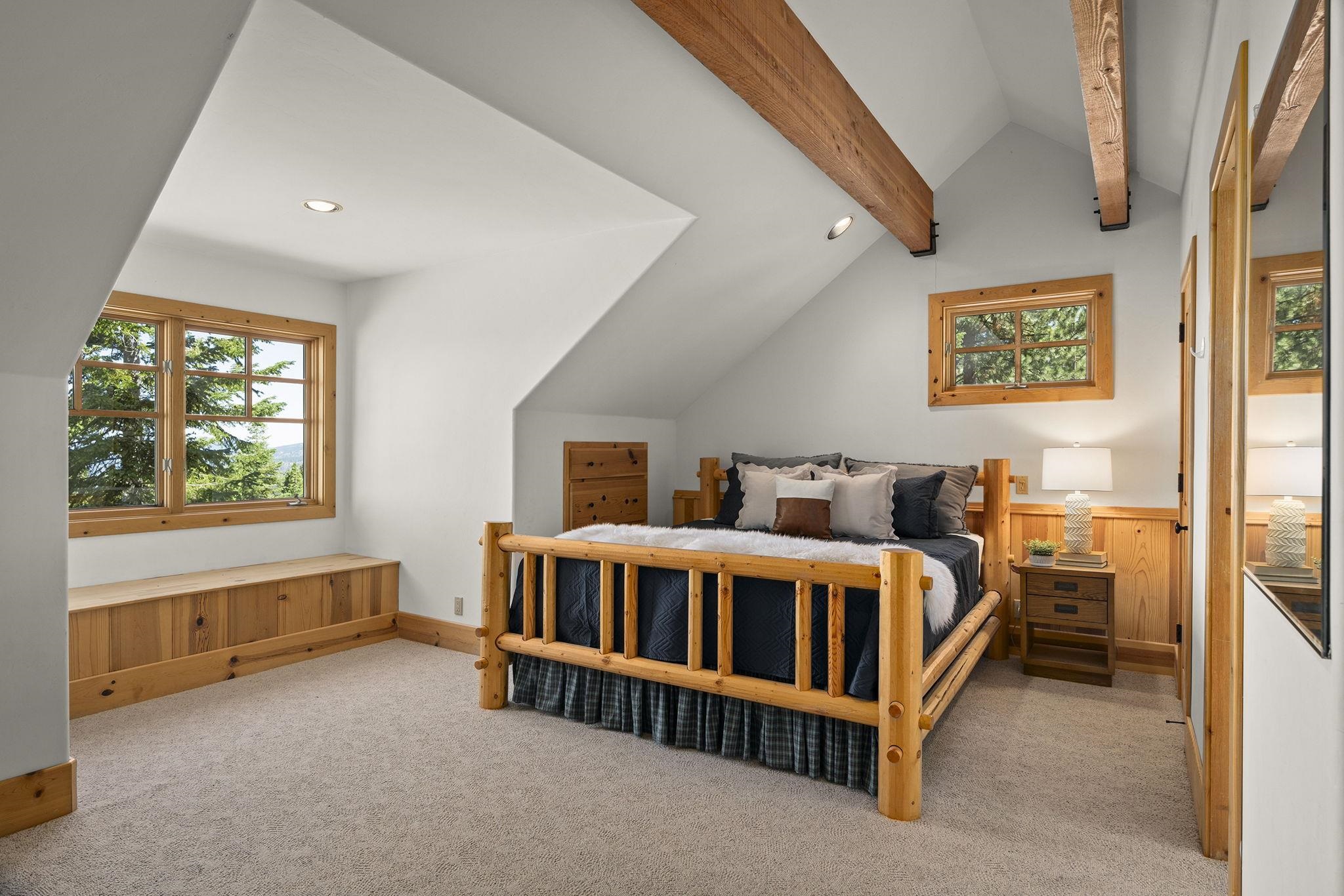 18168 La Mirada Road Truckee, CA 96161 - Photo 17 of 28 a bed room with a bed and a window