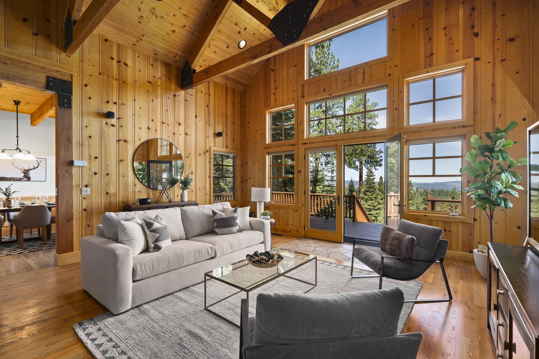 18168 La Mirada Road Truckee, CA 96161 - Photo 5 of 28 a living room with furniture and a floor to ceiling window