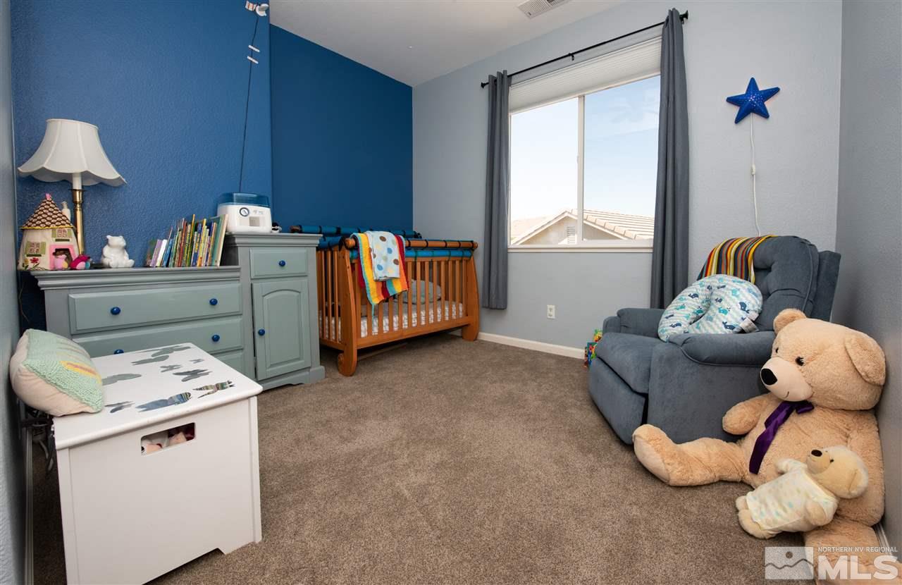 2480 Baton Drive Reno, NV 89521 - Photo 12 of 15 a bed room with furniture and a window